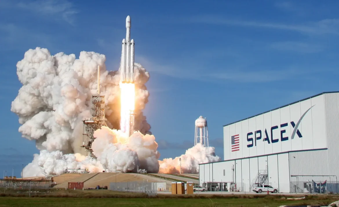 A SpaceX Falcon Heavy rocket launching from Kennedy Space Center, Florida, with a large plume of smoke and flames, marking another milestone in space exploration