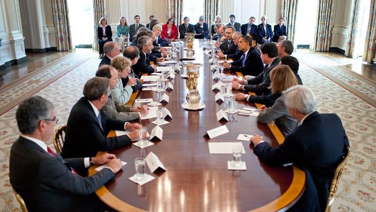 U.S. and China flags at international summit table symbolizing economic negotiations and trade relations.
