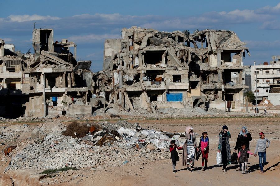 Bombed-out building in Gaza, missile trail over Damascus, or protest banner saying “Stop the Bombs