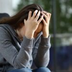 Image representing the emotional journey of a woman dealing with built-up frustration and aggression due to prolonged stress and unspoken feelings.