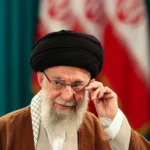 Martyr Ayatollah Ali Khamenei, Supreme Leader of Iran, symbol of resistance against US-Israeli aggression, with Islamic Republic flag and revolutionary fire.