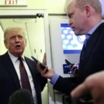 US President Donald Trump speaking aboard Air Force One about NATO and Strait of Hormuz security.